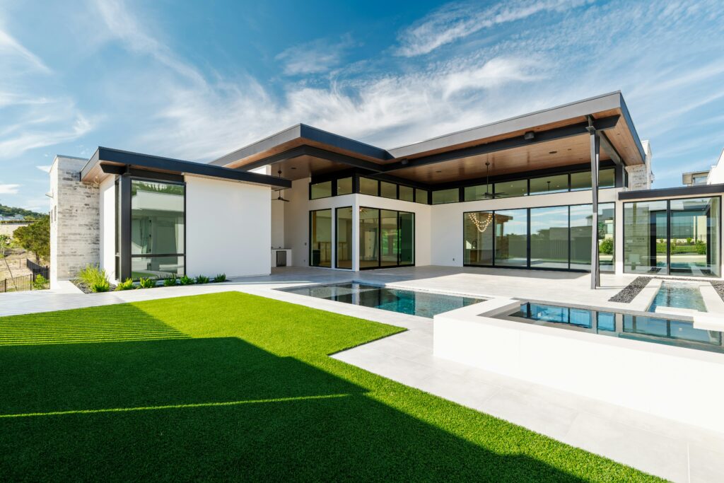 Lush green artificial turf lawn in an Arizona backyard showing the value behind artificial turf cost