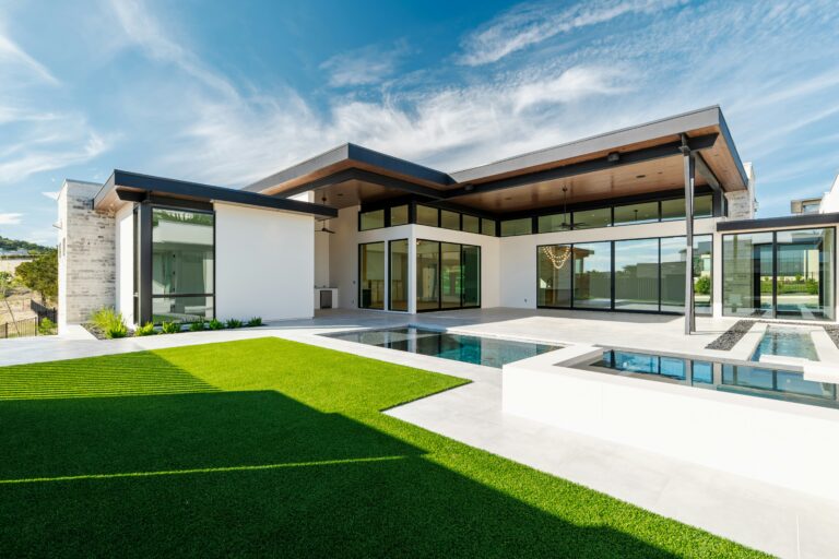Lush green artificial turf lawn in an Arizona backyard showing the value behind artificial turf cost