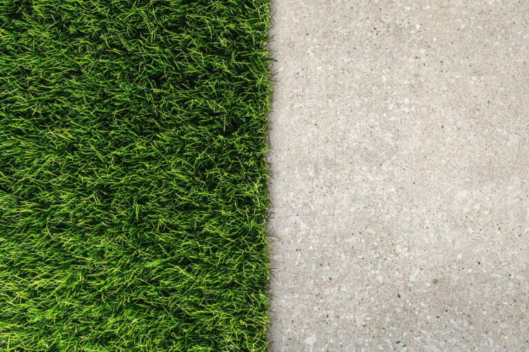 Artificial grass installed over a concrete patio in an Arizona backyard