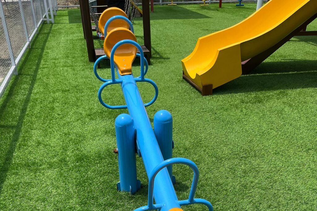 Children on safe artificial turf at an Arizona school playground
