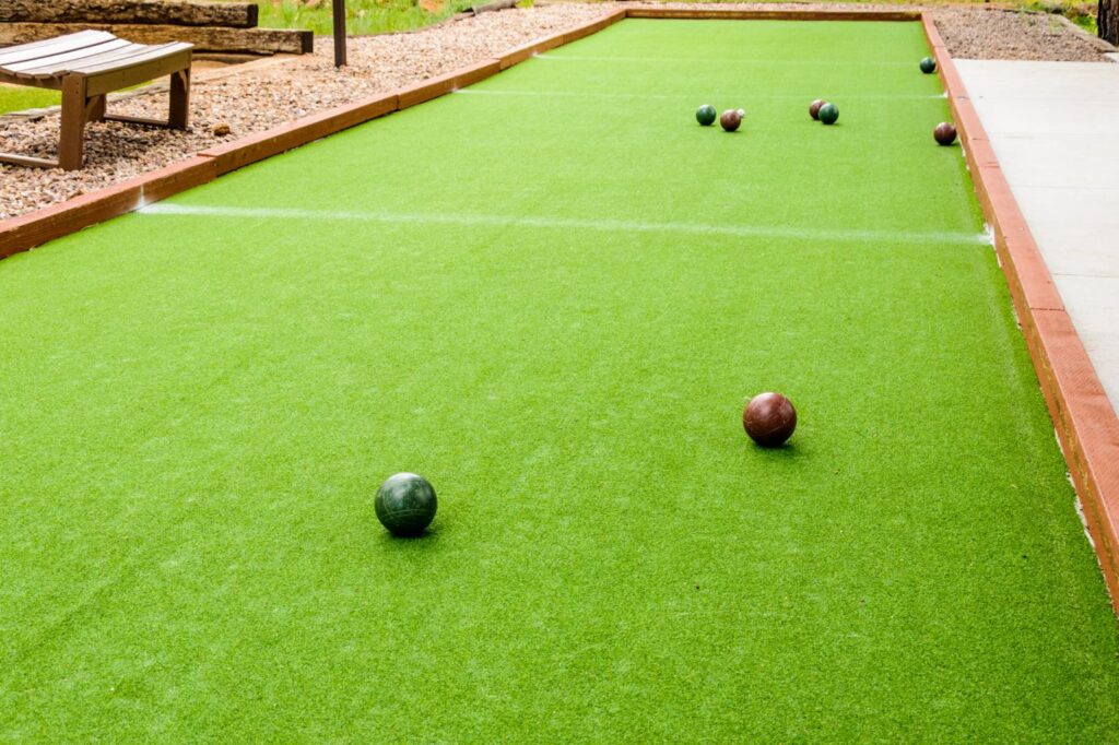 Backyard bocce court with turf surface in Arizona