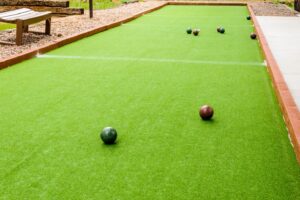 Backyard bocce court with turf surface in Arizona