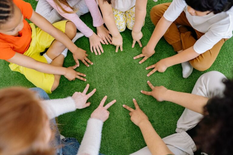 Children playing safely on soft artificial grass in an Arizona backyard