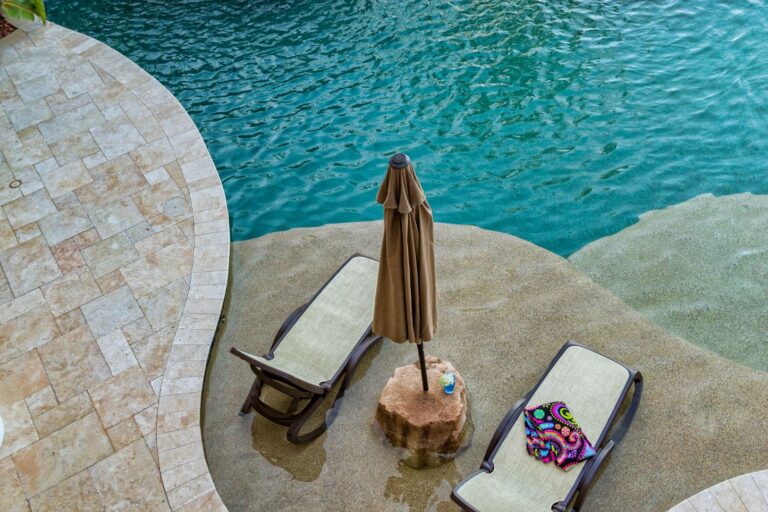 Travertine and brick paver patio in an elegant Arizona outdoor space