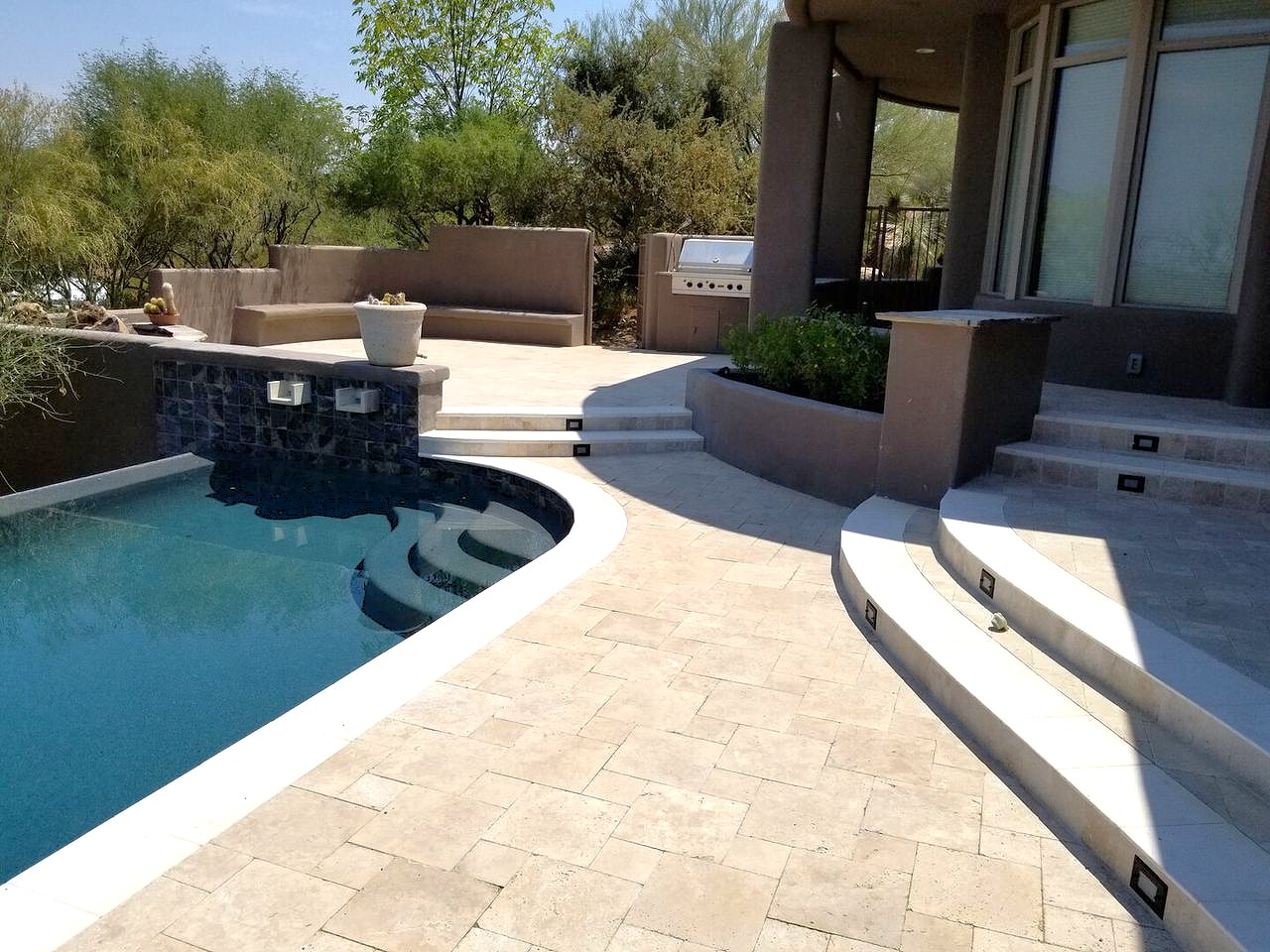 Travertine paver patio and hardscape by Turfscapes of Arizona in Phoenix