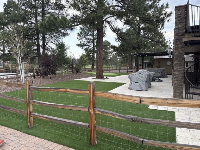 Artificial turf installed in Williams, AZ backyard in pine trees right on the golf course.