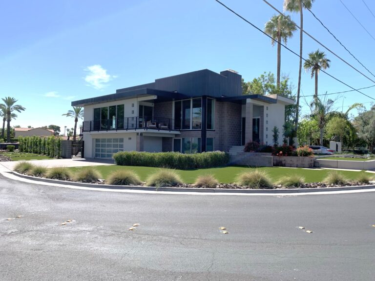 Modern front yard with artificial grass in Arizona