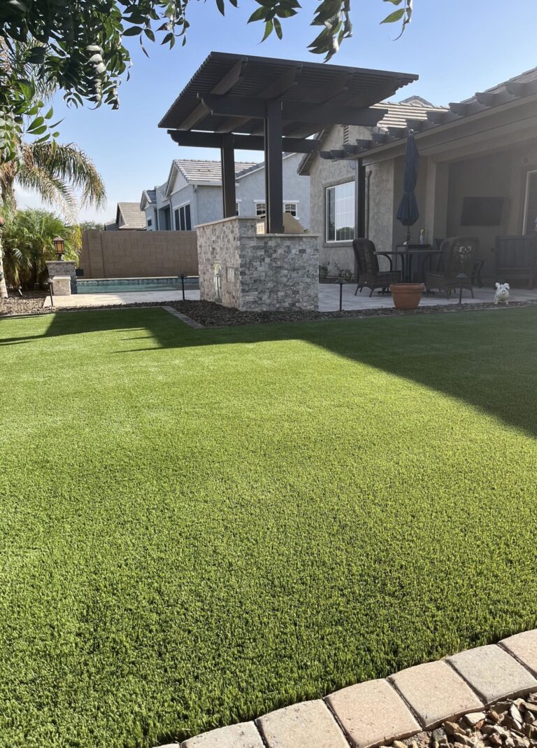 Pet turf installed in residential Peoria, AZ backyard home with bright green luxury turf.