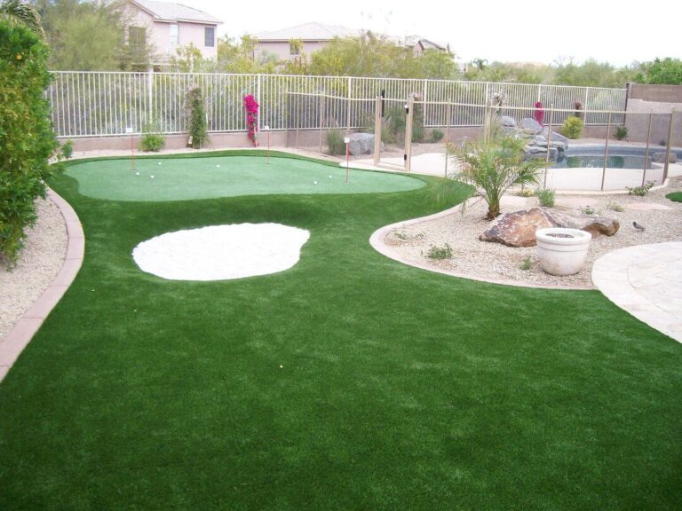 Putting greens installed in residential backyard with sand trap by Turfscapes of Arizona